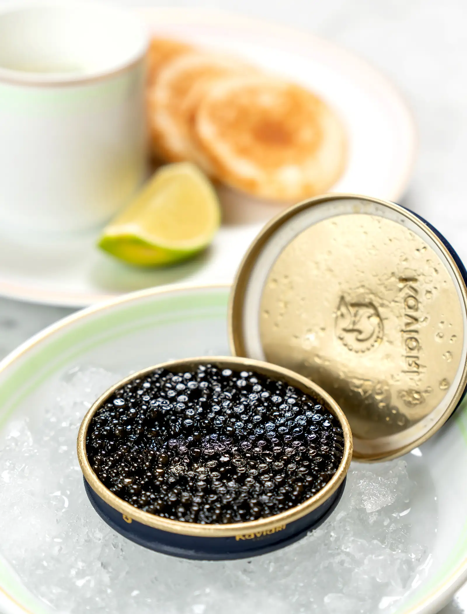 Caviar blinis with lime and sour cream