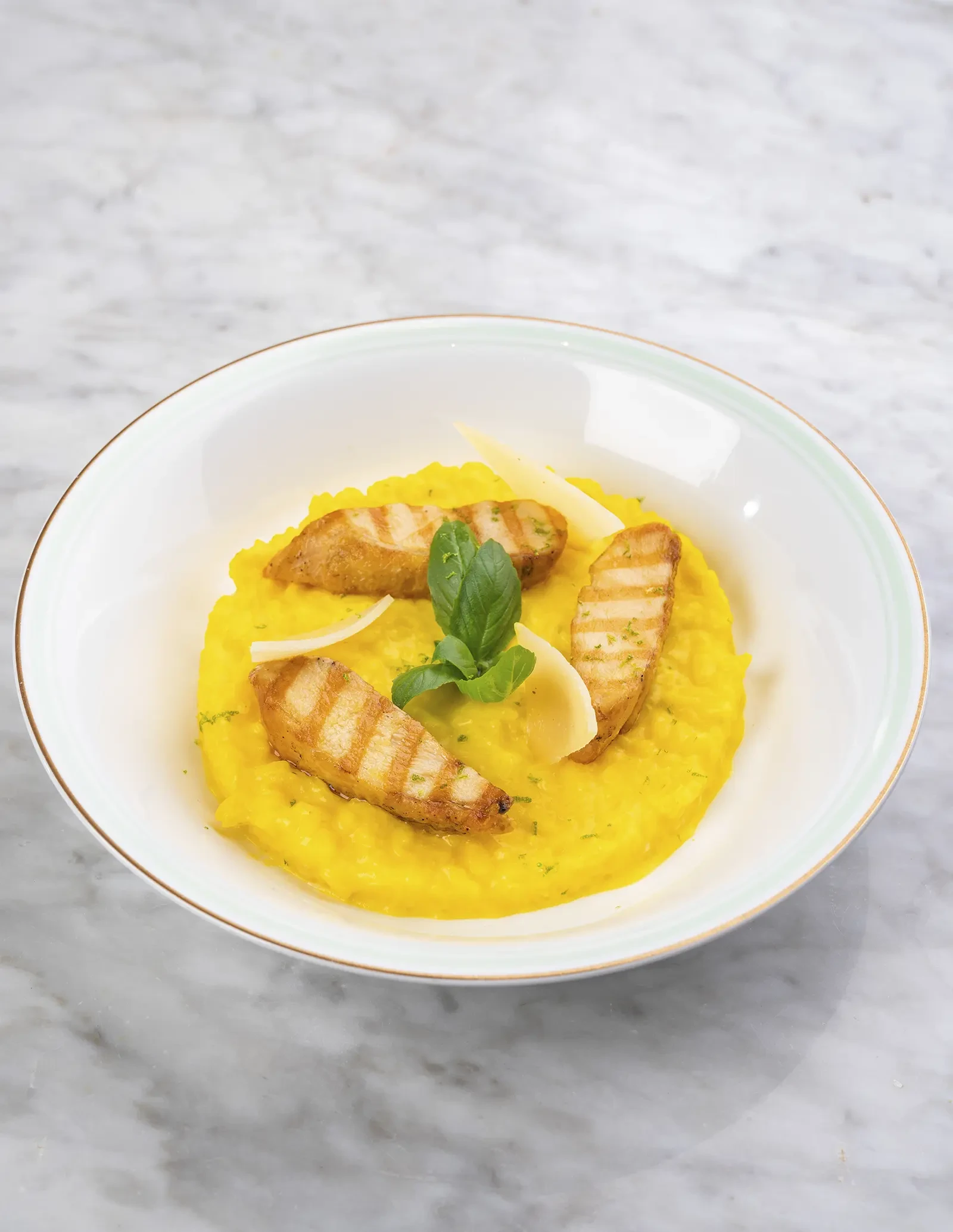 Saffron risotto chicken - beautifully plated and ready to enjoy