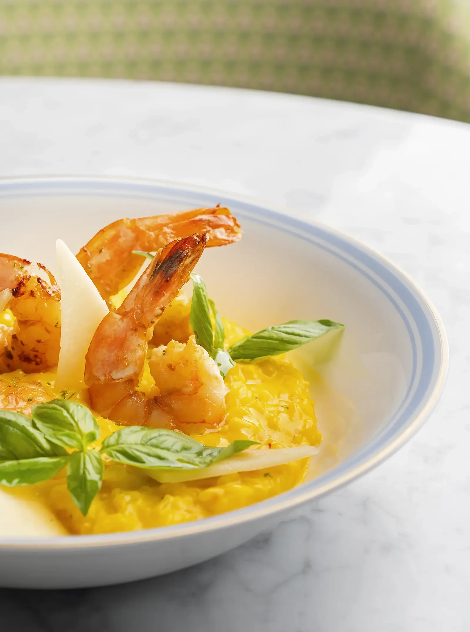Saffron risotto prawns - beautifully plated and ready to enjoy